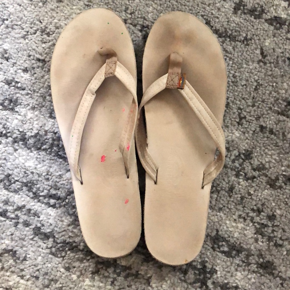 Tan rainbow flip flops